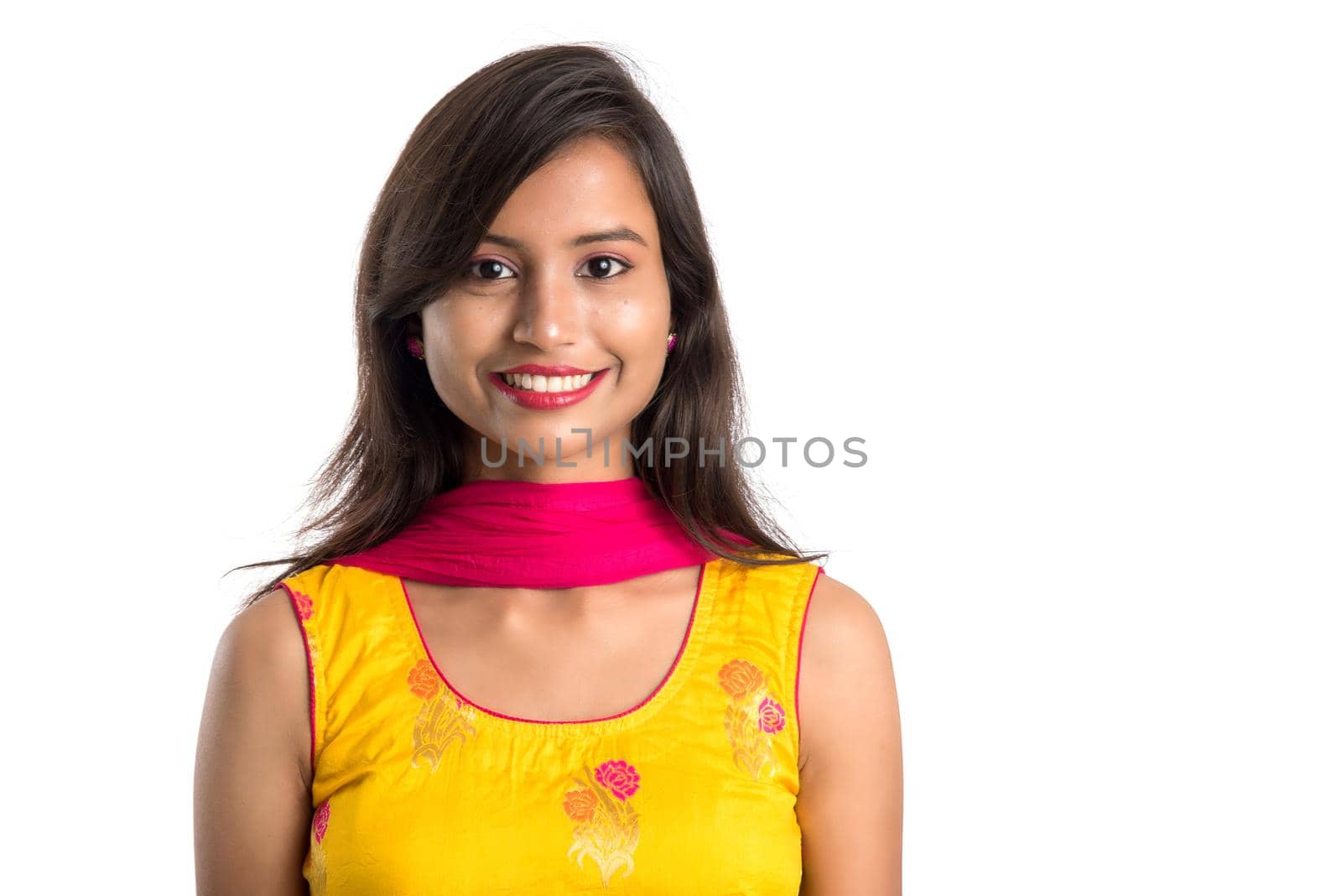 Portrait of beautiful young smiling girl on a white background. by DipakShelare