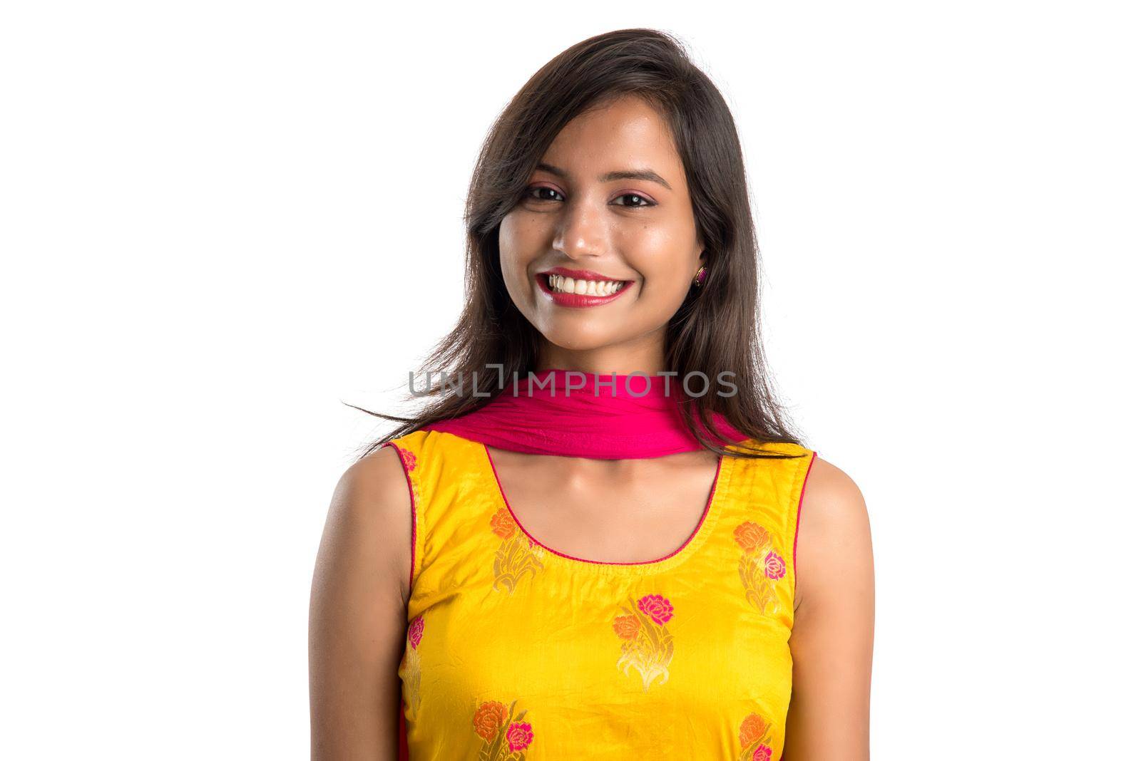 Portrait of beautiful young smiling girl on a white background.