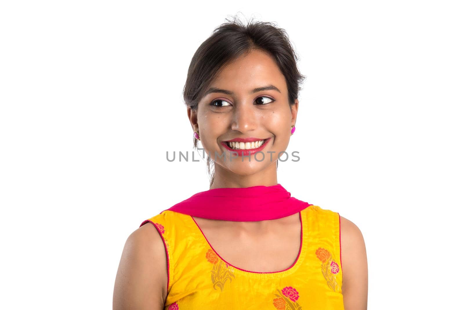 Portrait of beautiful young smiling girl on a white background. by DipakShelare