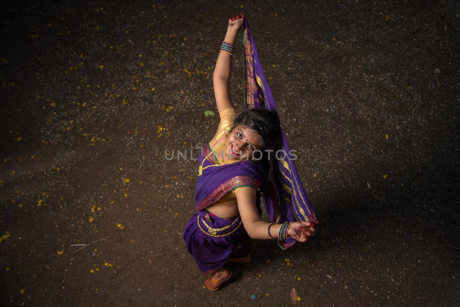 Indian Traditional Beautiful young girl in saree posing outdoors