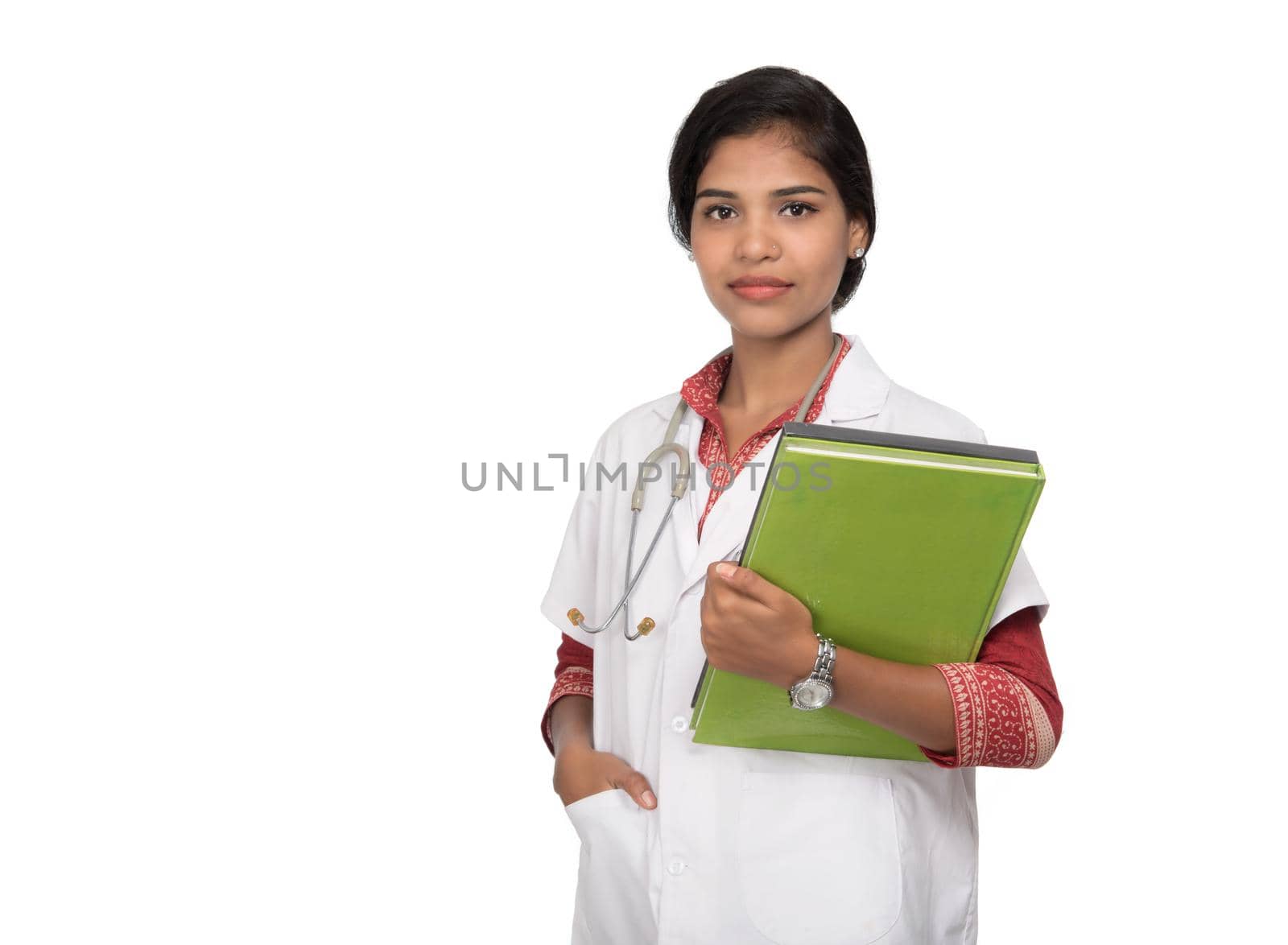 Young woman doctor holding book with stethoscope