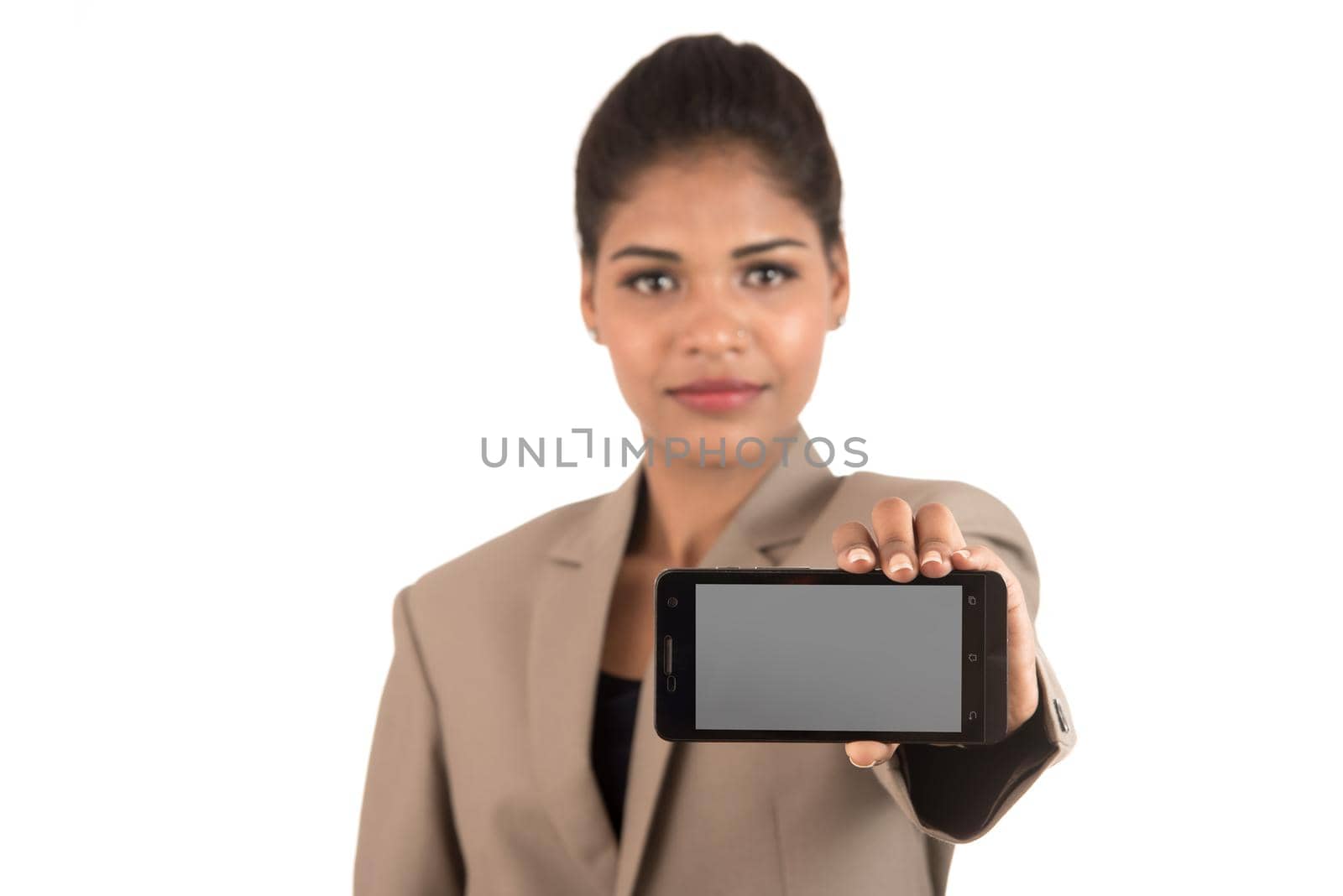 Young beautiful woman holding blank screen smart phone on white background