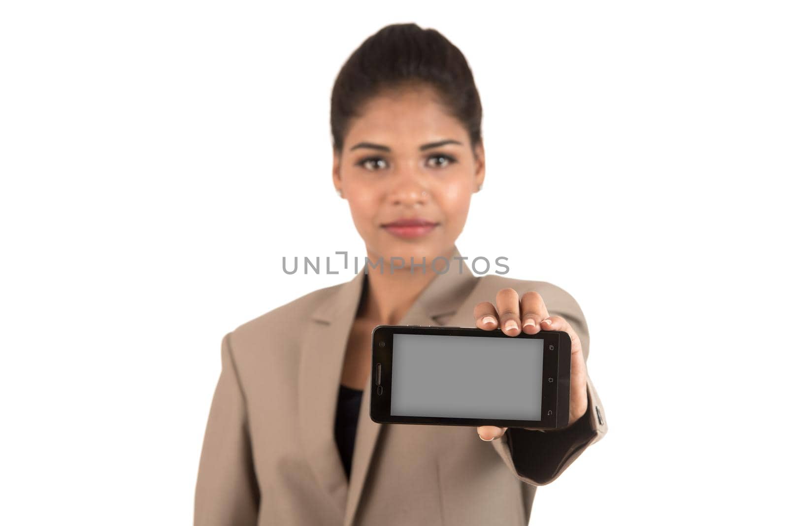 Young beautiful woman holding blank screen smart phone on white background