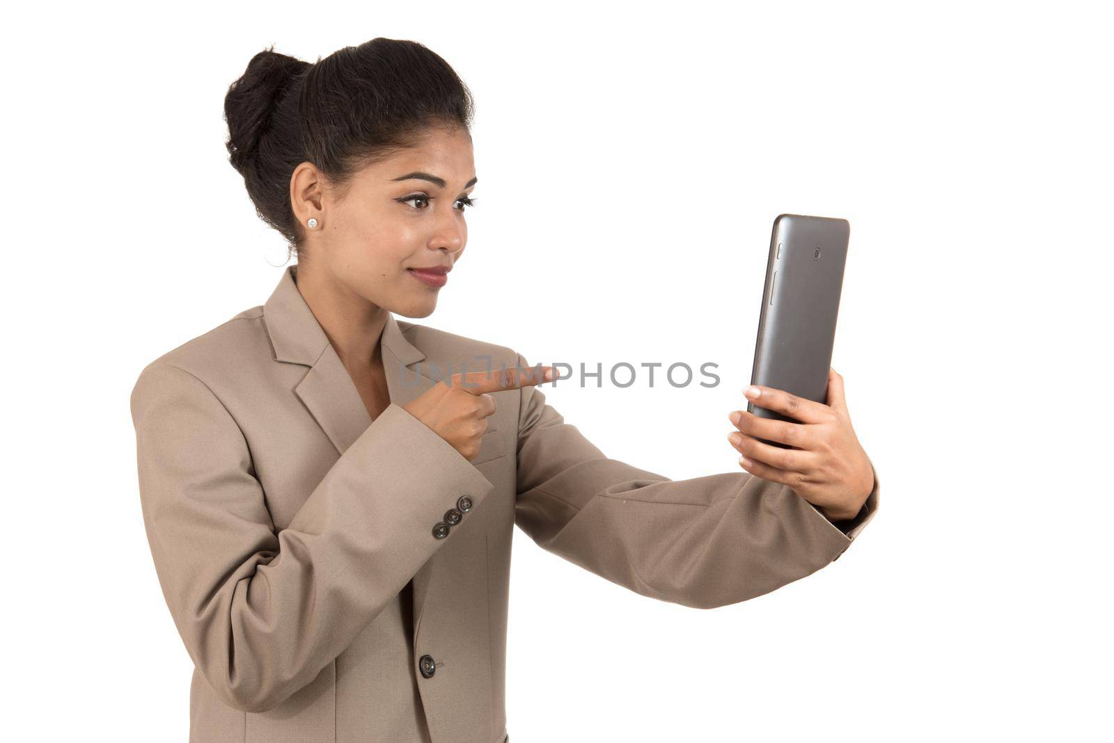 Beautiful woman talking in a video conference online by using smartphone