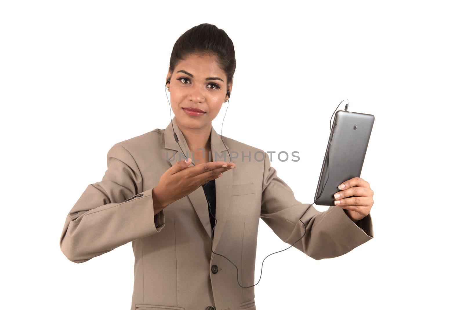 Beautiful woman talking in a video conference online by using smartphone and showing signs