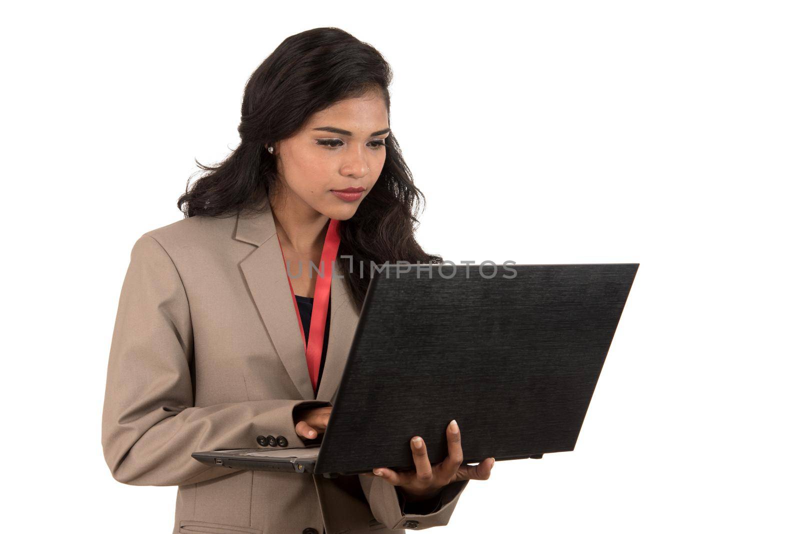 Young happy smiling woman holding laptop.