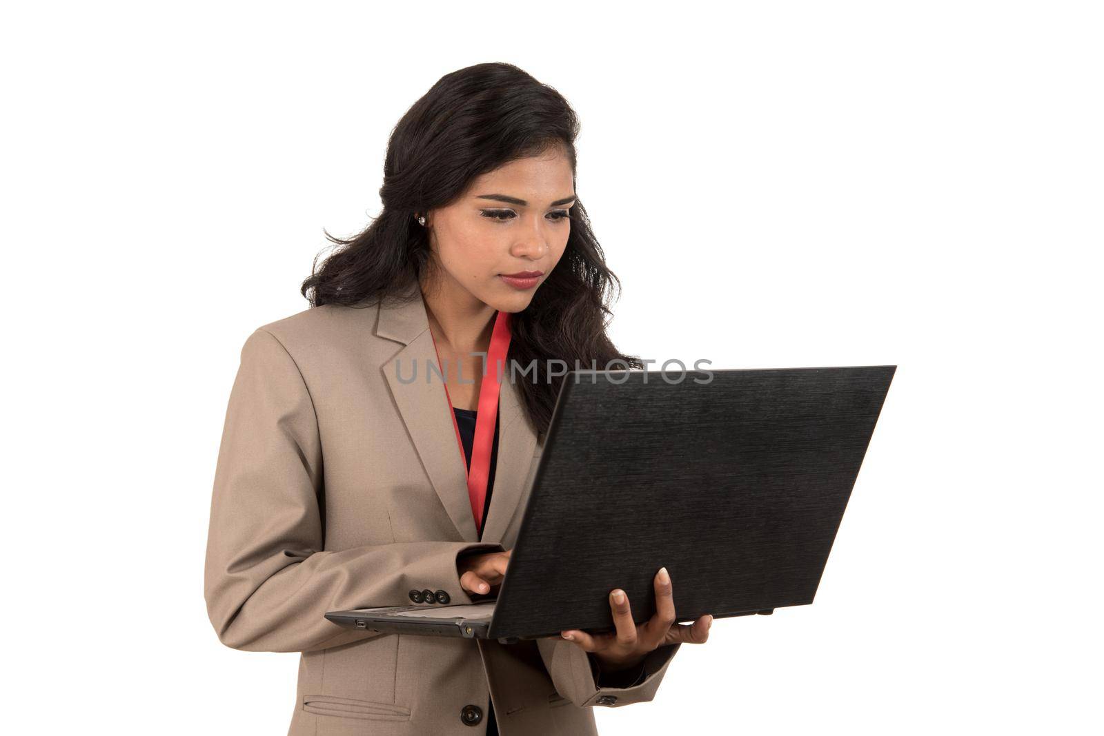 Young happy smiling woman holding laptop.