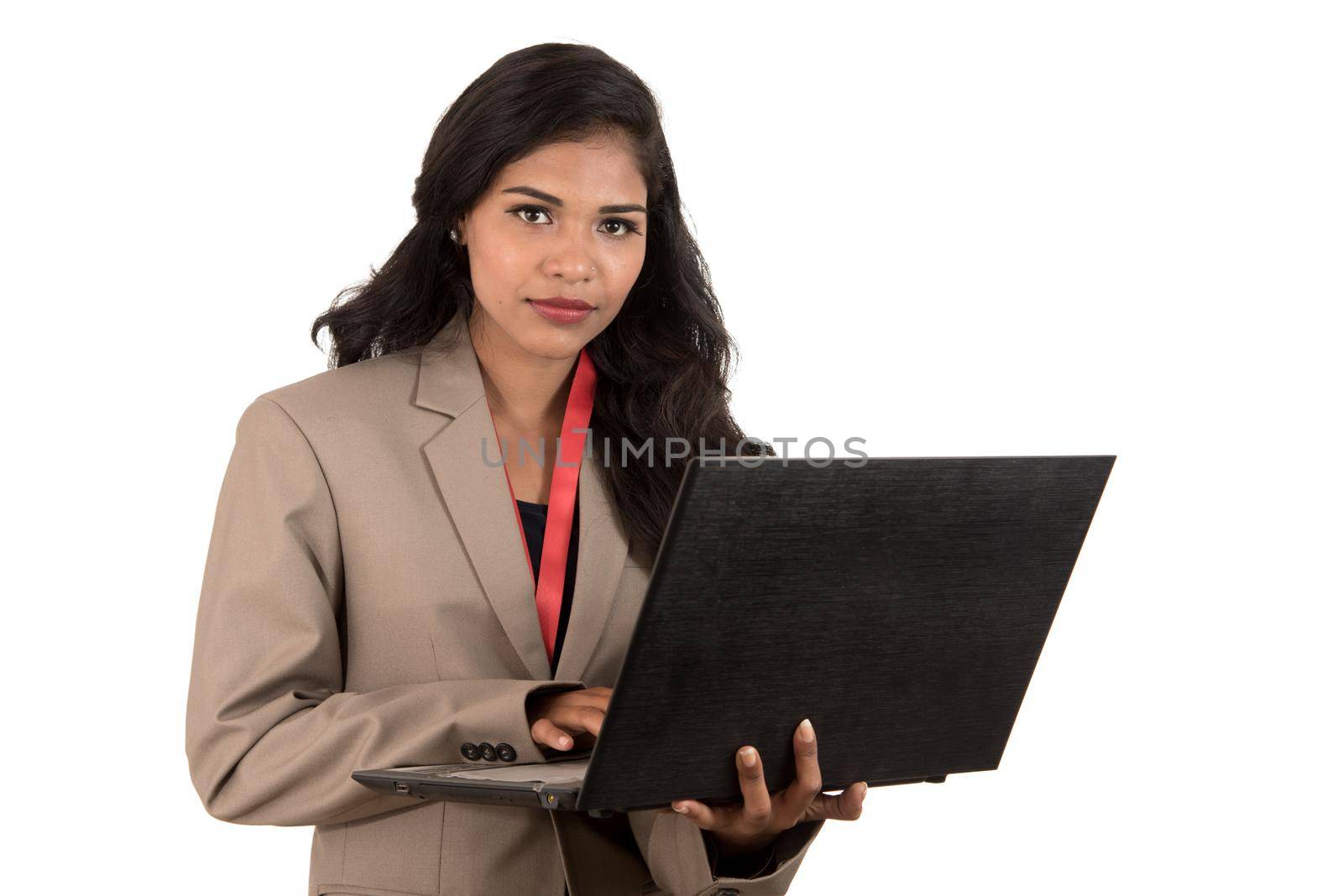 Young happy smiling woman holding laptop.