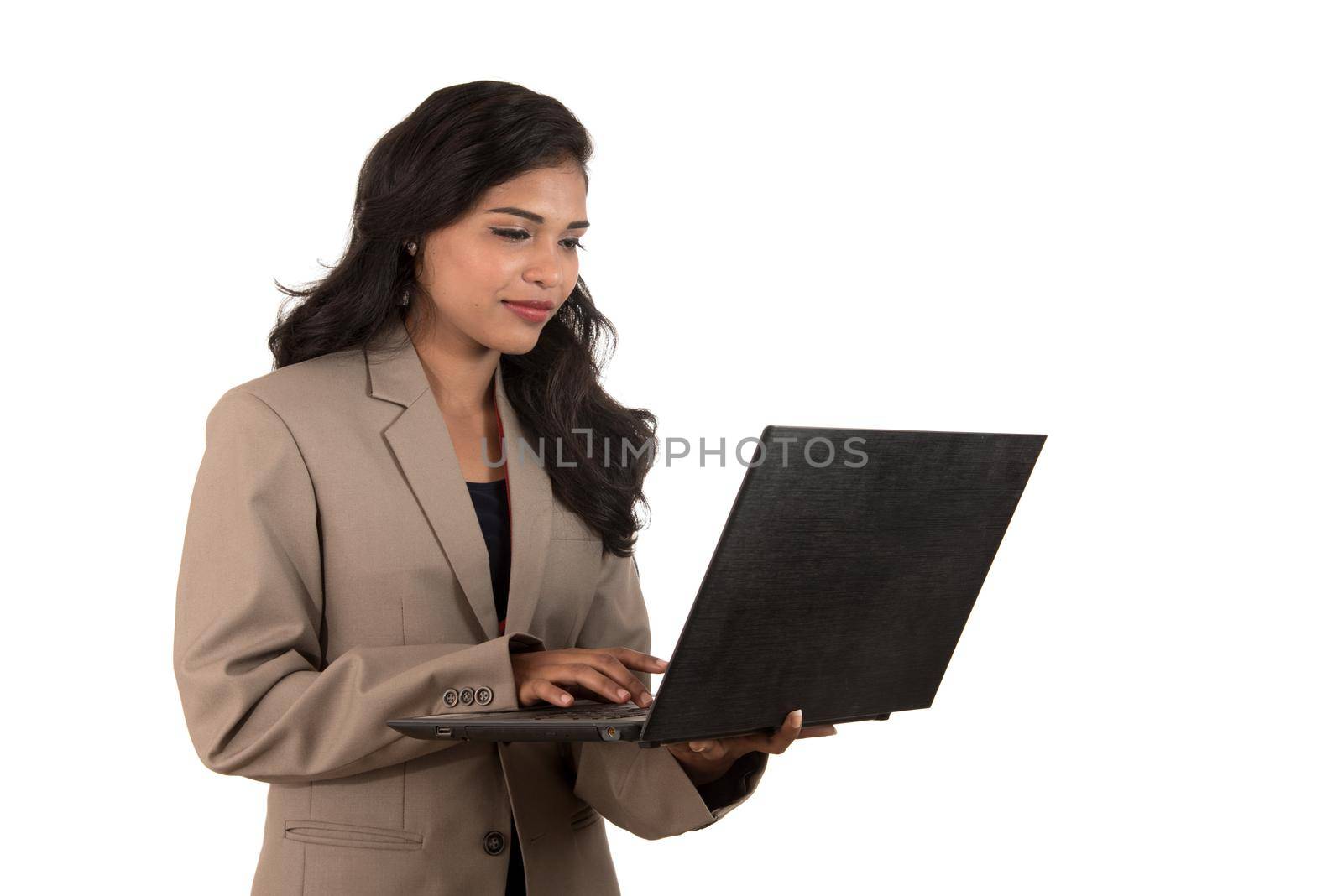 Young happy smiling woman holding laptop.