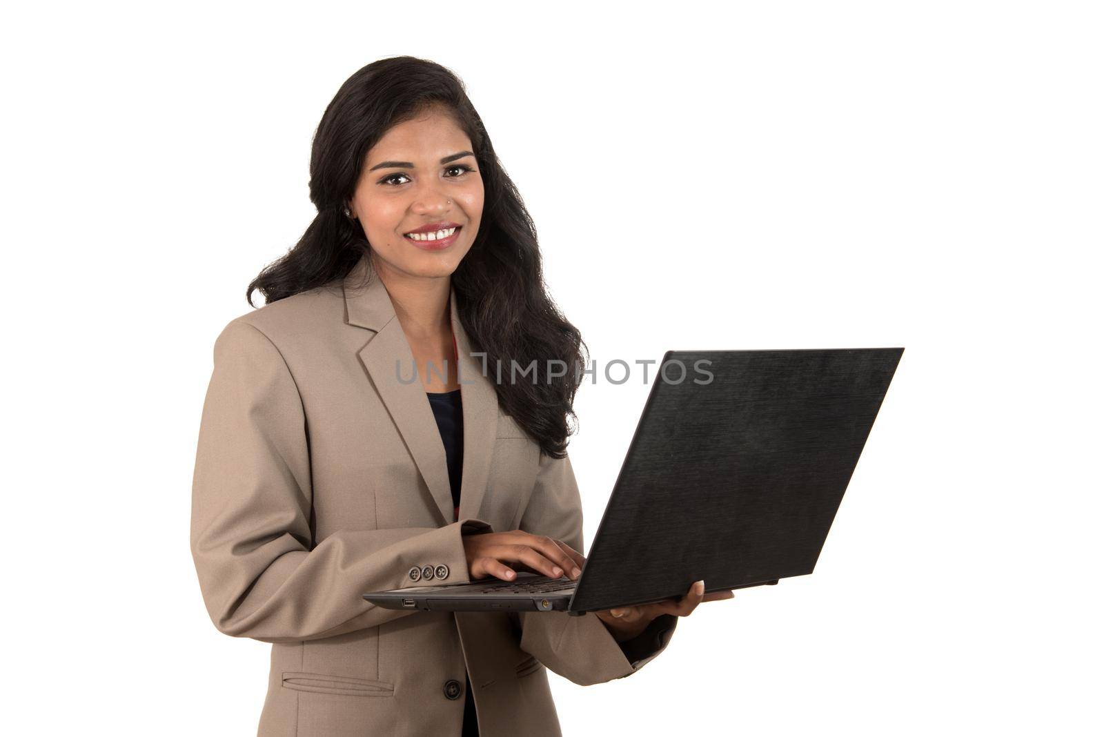 Young happy smiling woman holding laptop.