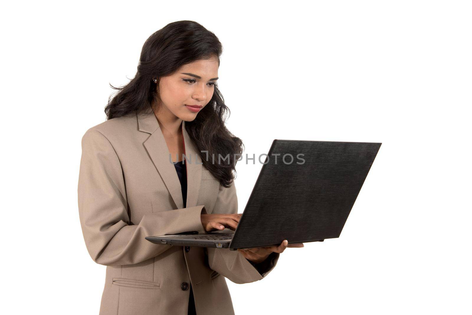 Young happy smiling woman holding laptop.