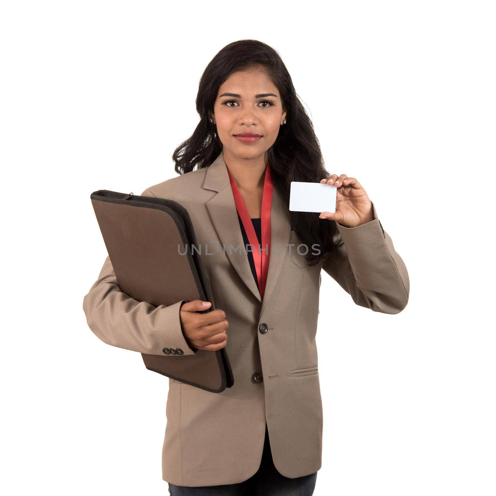 Smiling business woman holding a blank business card or ID card over white background by DipakShelare