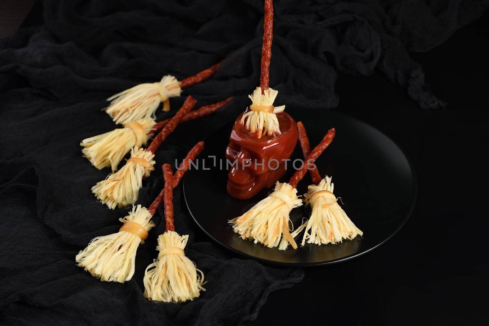 Witches Broom of smoked cheese suluguni and salami  by Apolonia