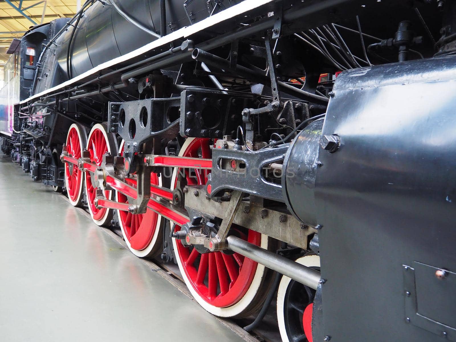 National Railway Museum, York, UK, August 19 2018: Driving wheels and coupling side rods of KF class steam locomotive designed by Colonel Kenneth Cantlie 1935, used by the Chinese Government Railways