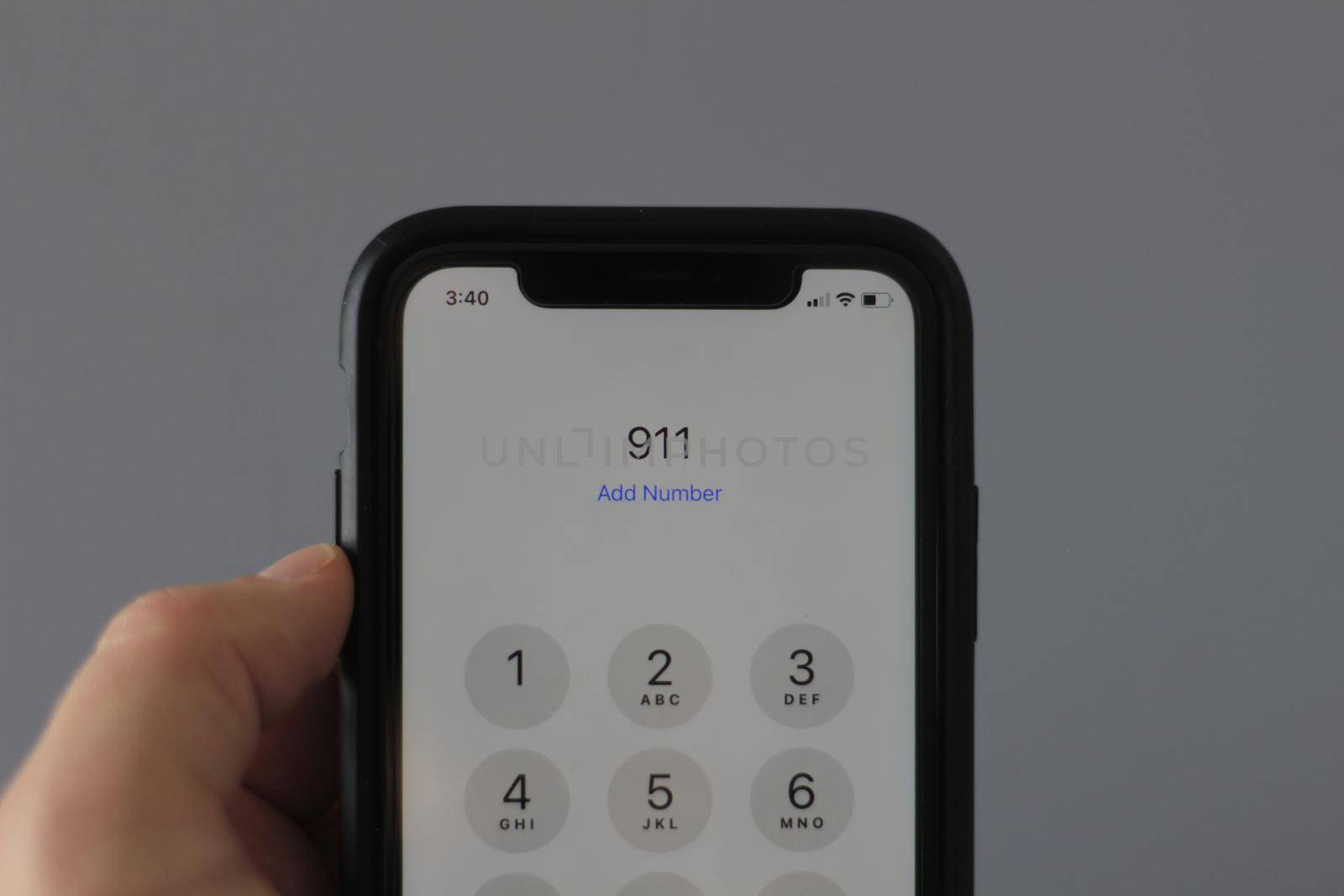 Dialing 9-1-1 on a smart phone, concept. High quality photo