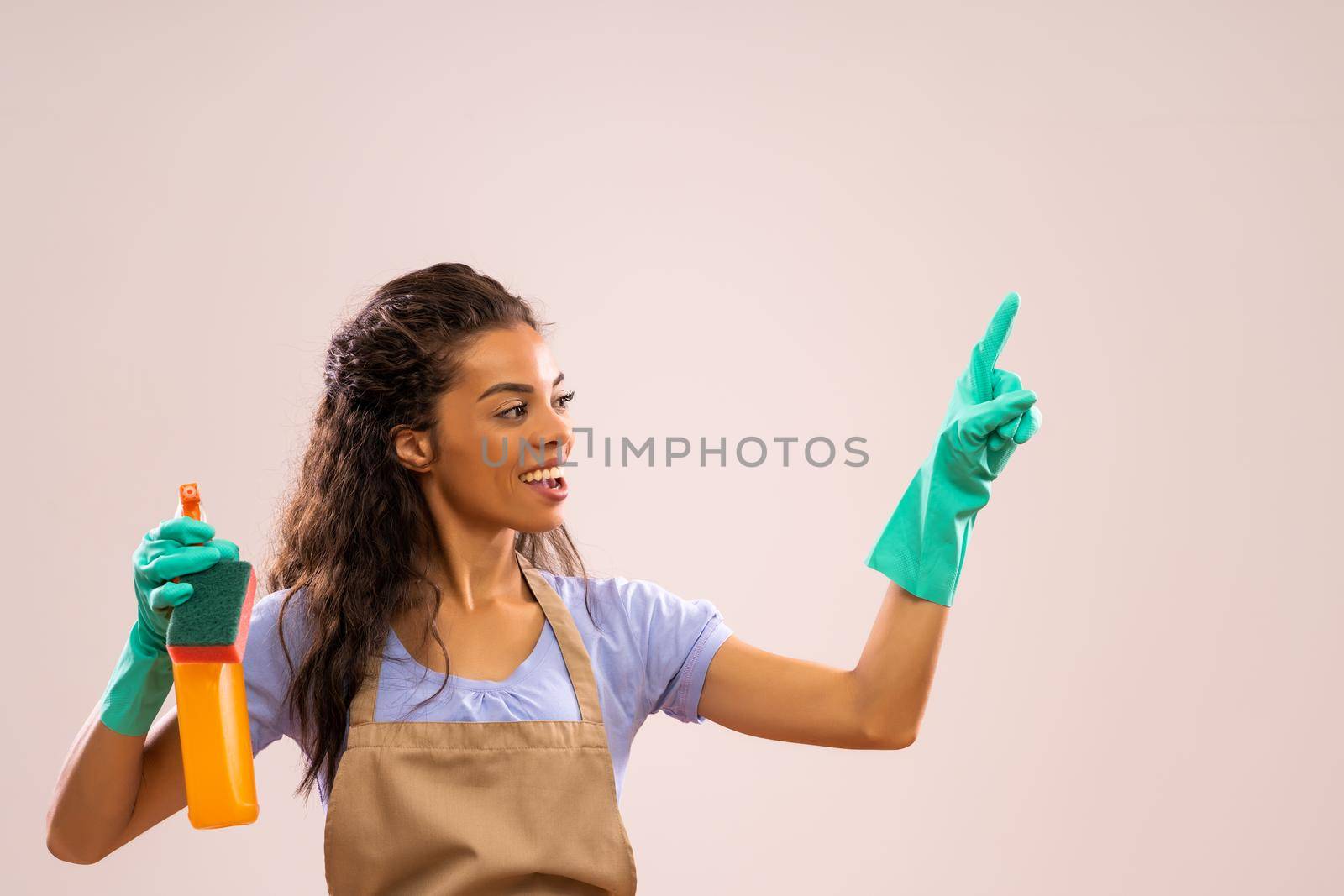 Portrait of african-american housewife who is ready for housework.