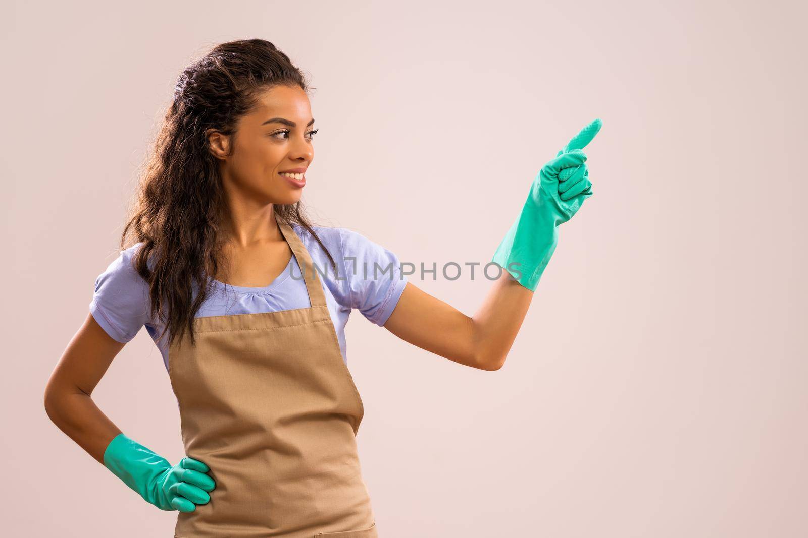 Portrait of african-american housewife who is ready for housework.