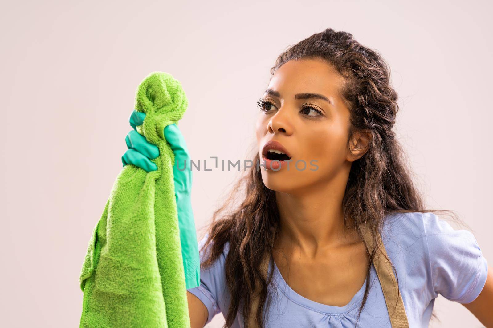 Portrait of african-american housewife who is obsessed with cleaning.