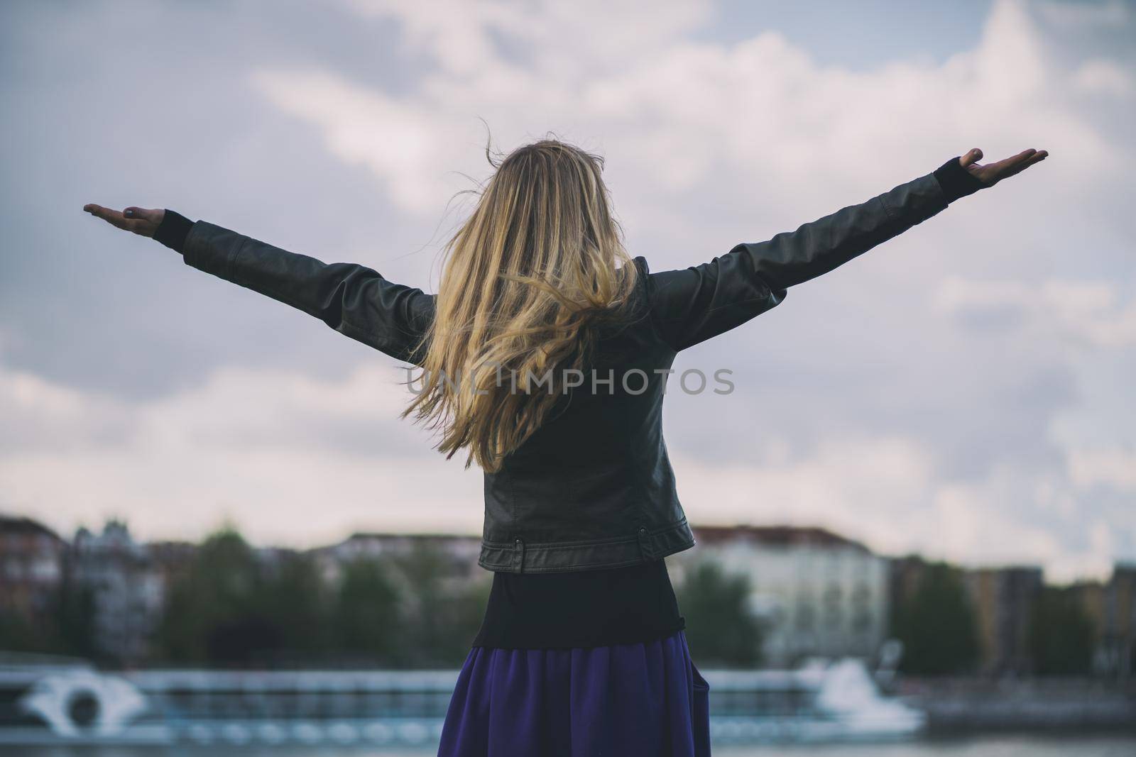 Woman enjoying fresh air after rain.