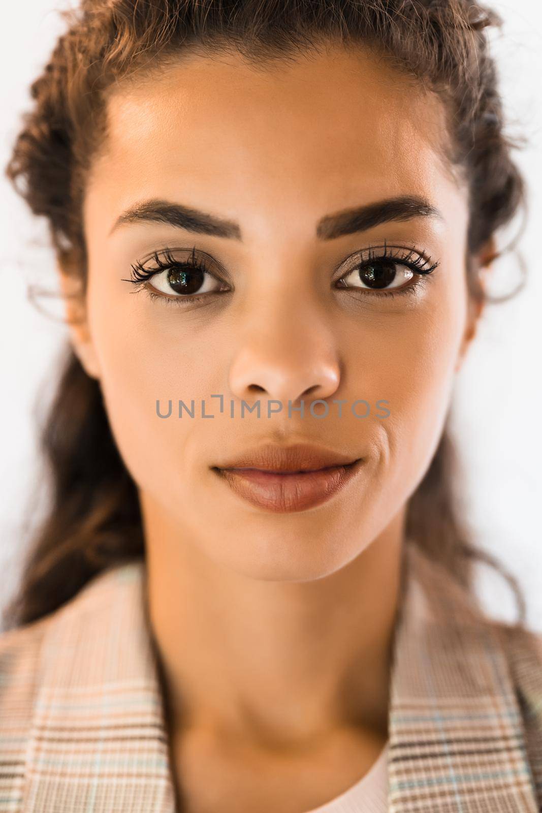 Portrait of beautiful african american woman looking at camera.