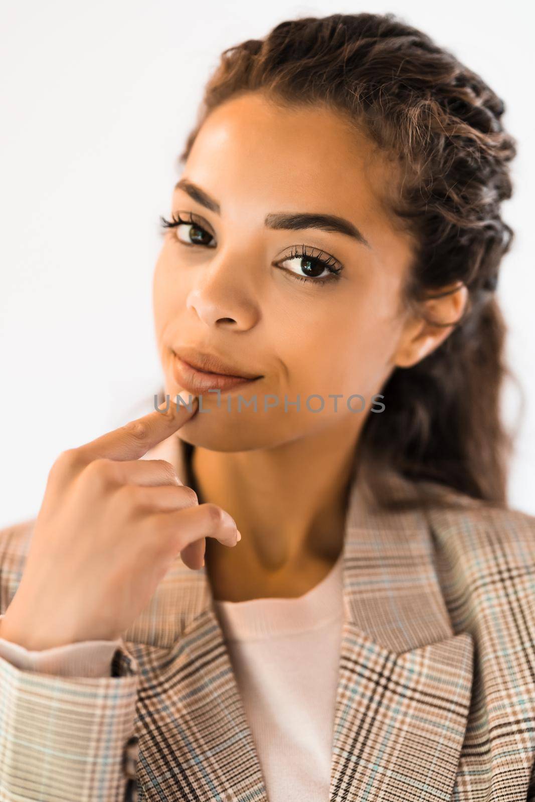 Portrait of beautiful african american woman who is worried and pensive.