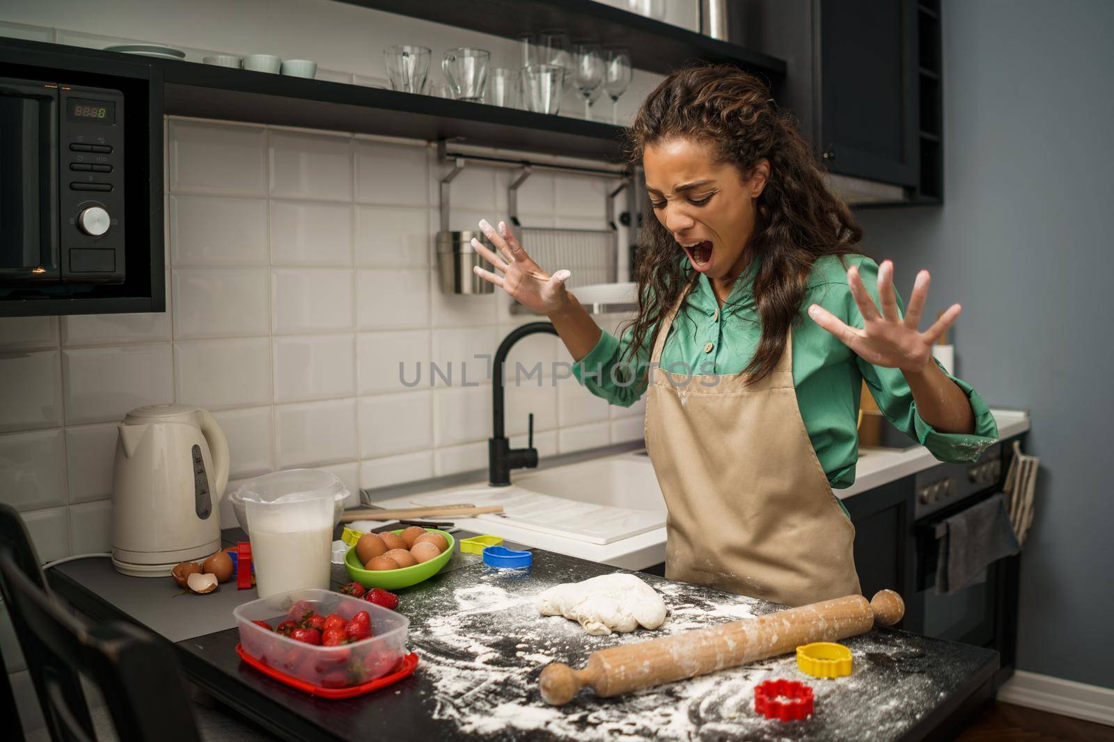 Woman in kitchen by djoronimo