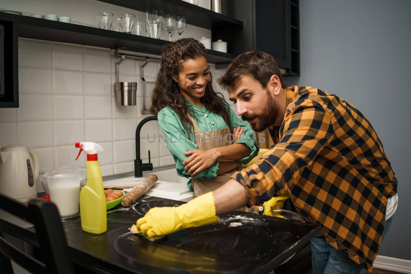 Couple in kitchen by djoronimo