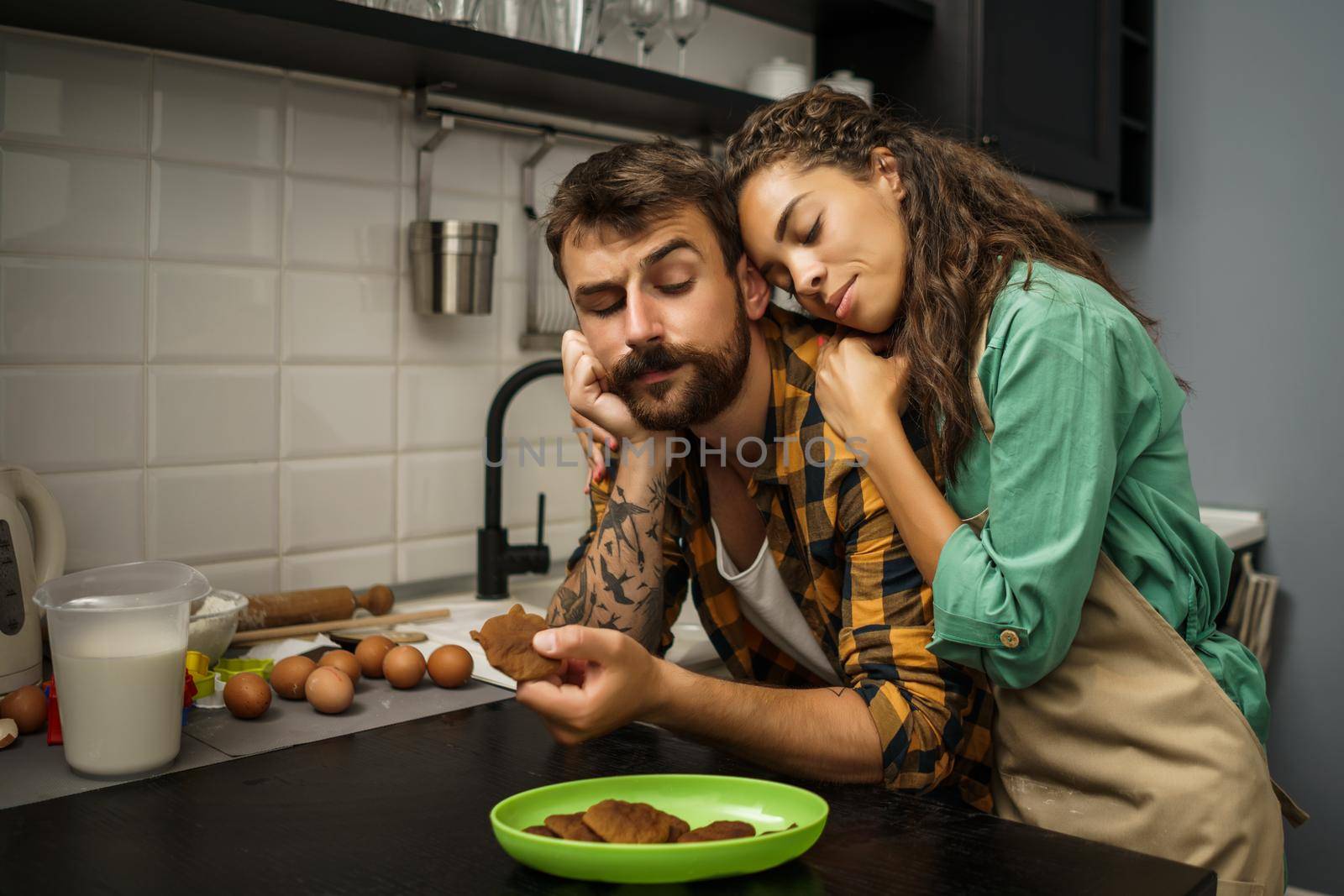 Couple in kitchen by djoronimo