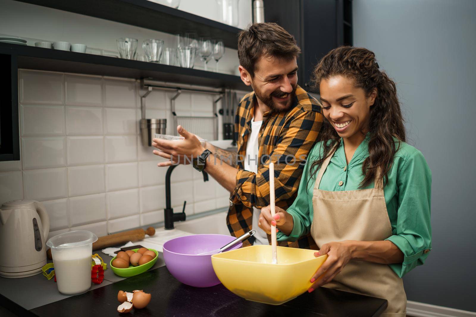 Couple in kitchen by djoronimo