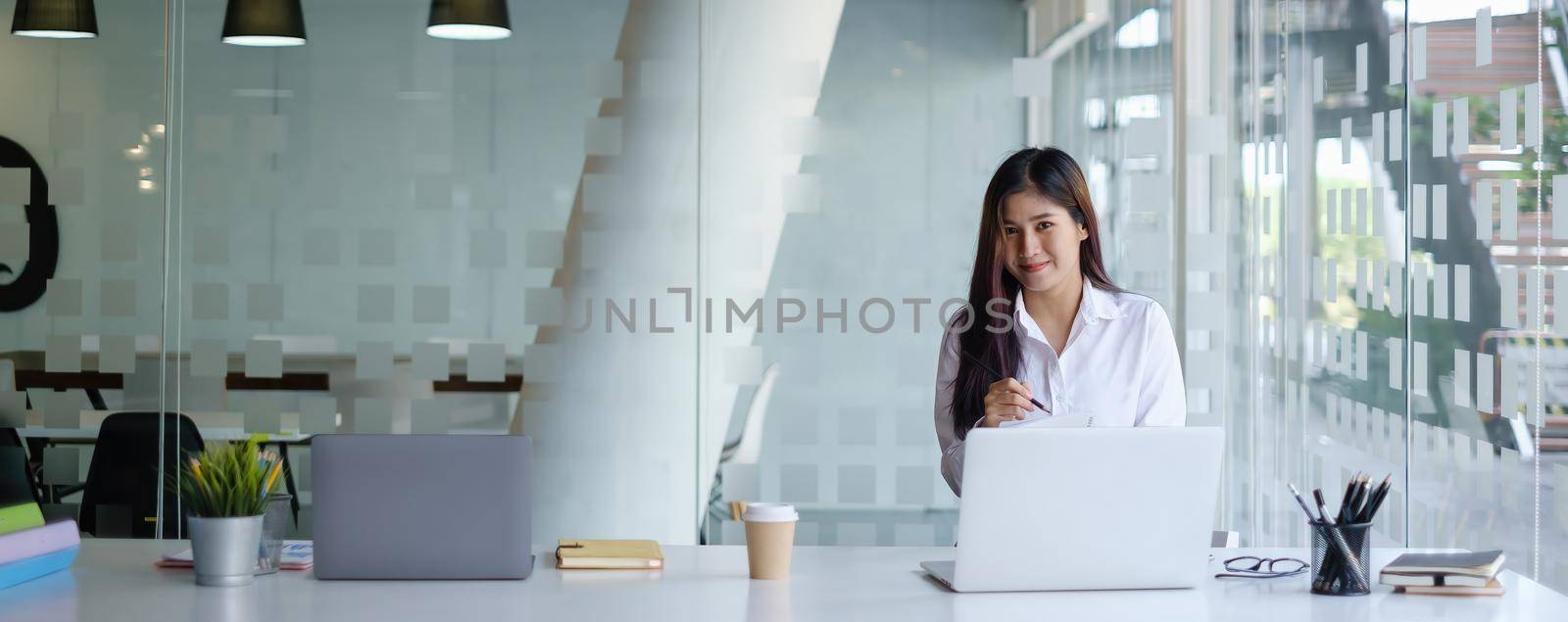 Fund managers researching and analysis Investment stock market by laptop computer