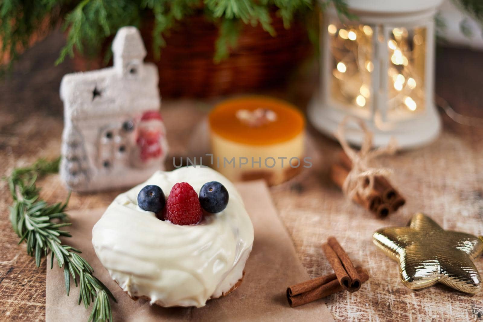 Cake decorated with blackberries and raspberries on the christmas table by vizland