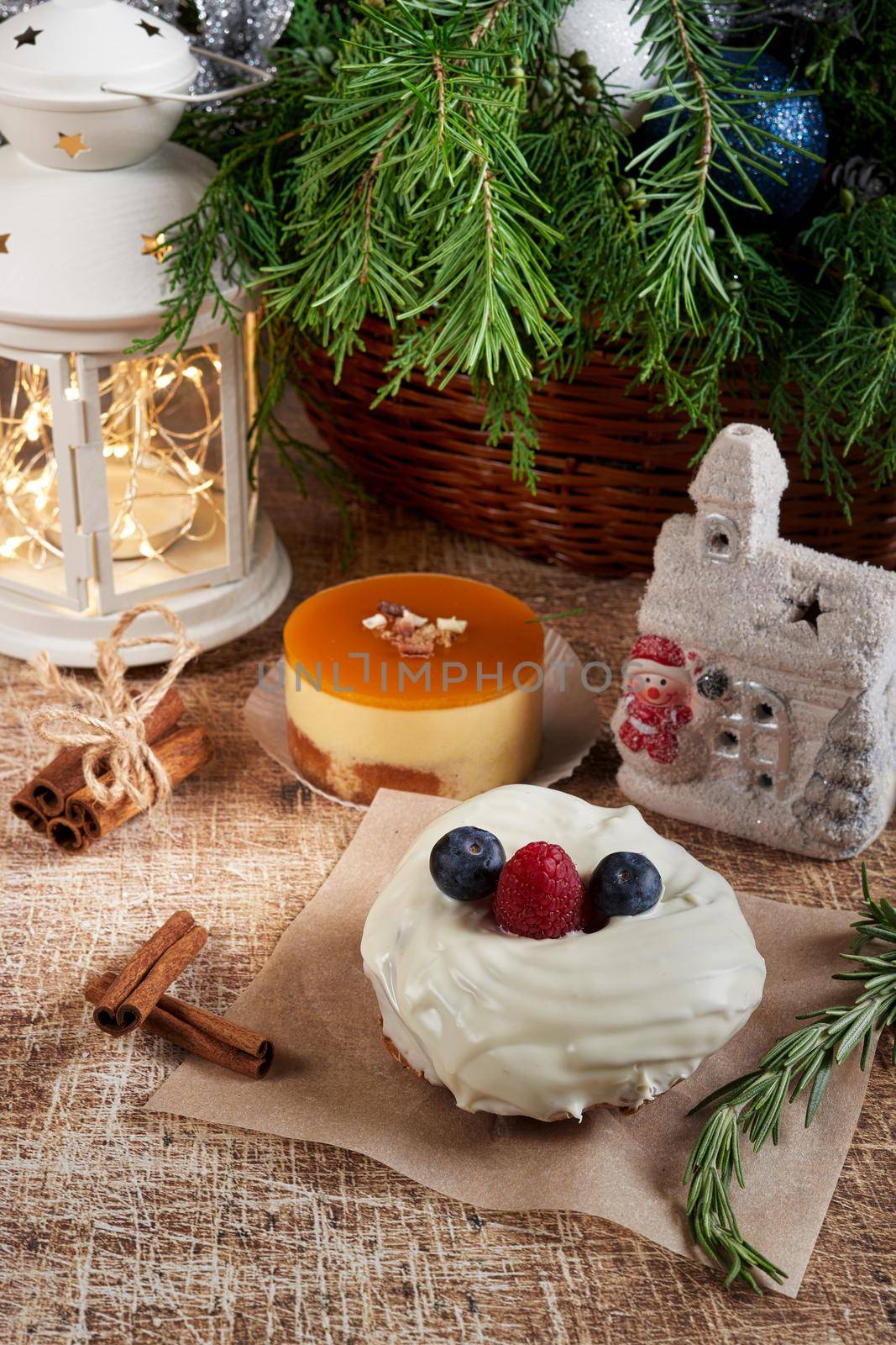 Cake decorated with blackberries and raspberries on the christmas table by vizland