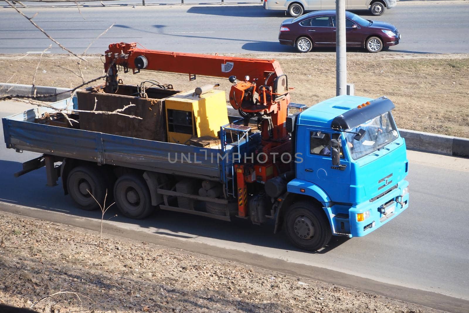 Cargo special transport, excavator rides on the road. by Olga26