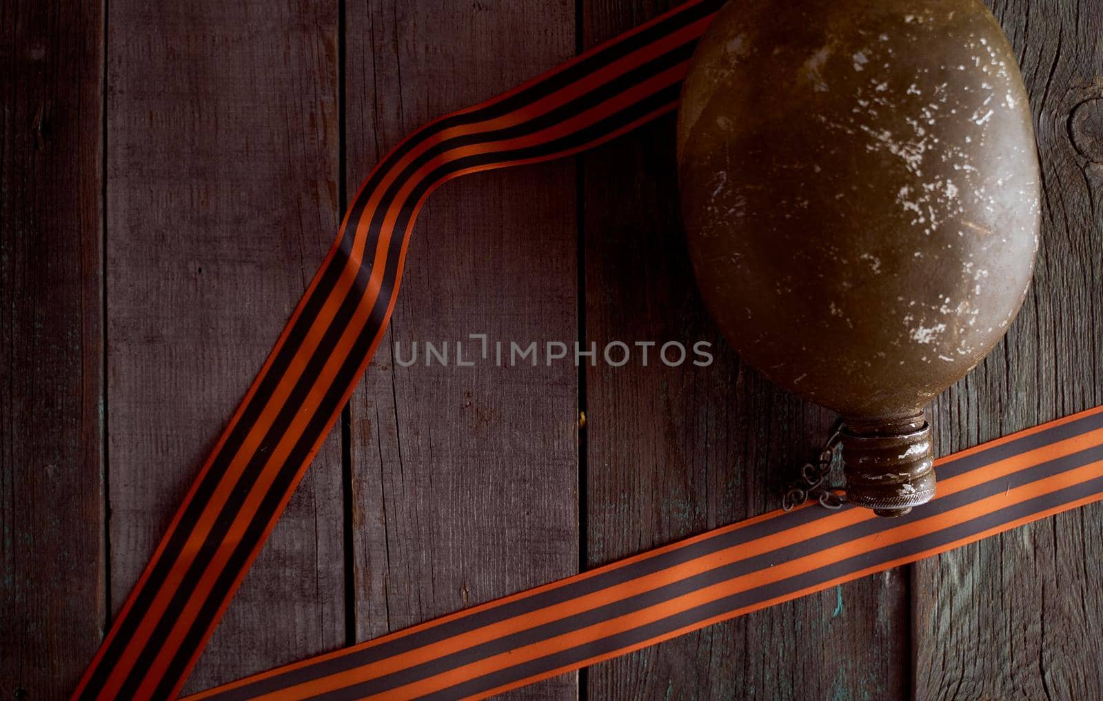 Soldier's flask with St. George ribbons. Victory Day Photos by Xelar