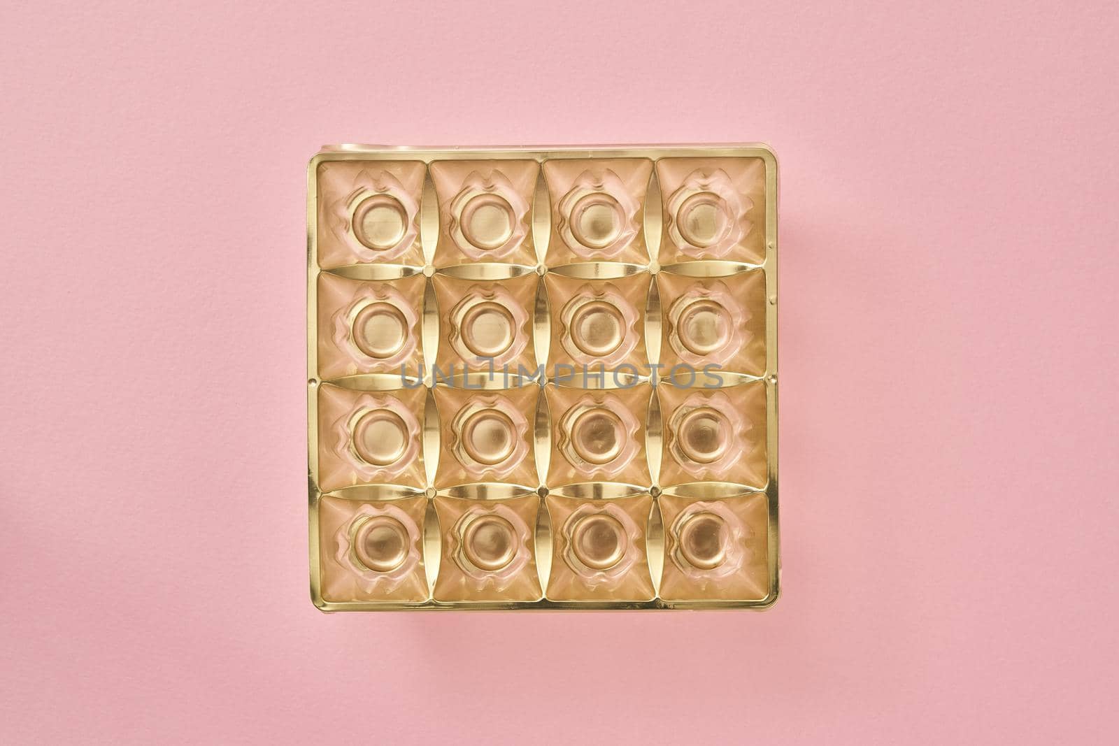 Empty box of chocolates on pink pastel background - birthday or party concept by madeleine_steinbach