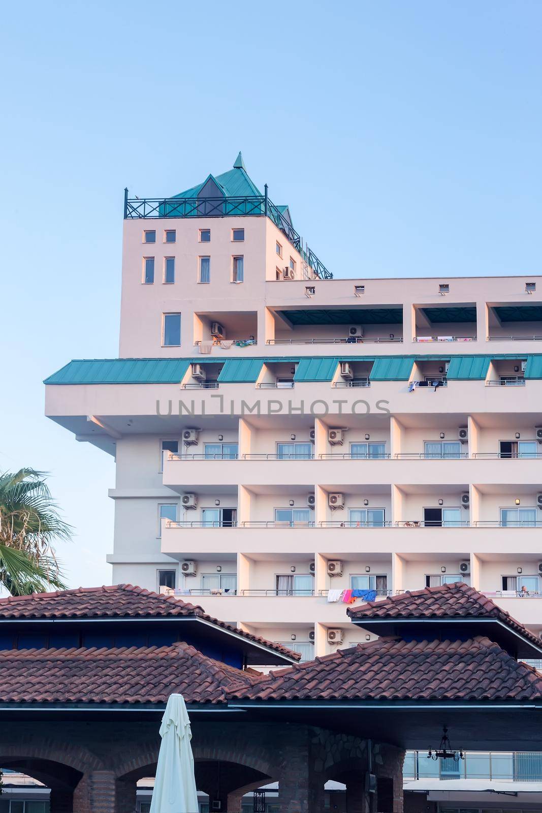 Hotel building in the Mediterranean resort town by georgina198