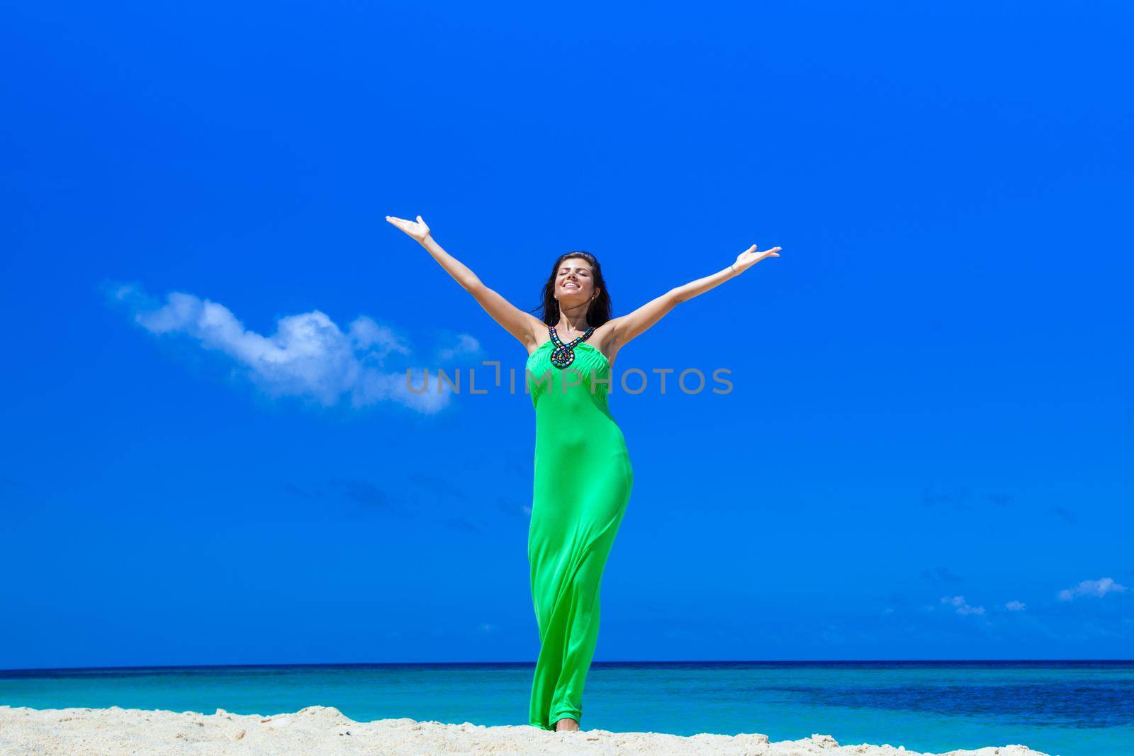 Woman enjoy vacation on beach by Yellowj