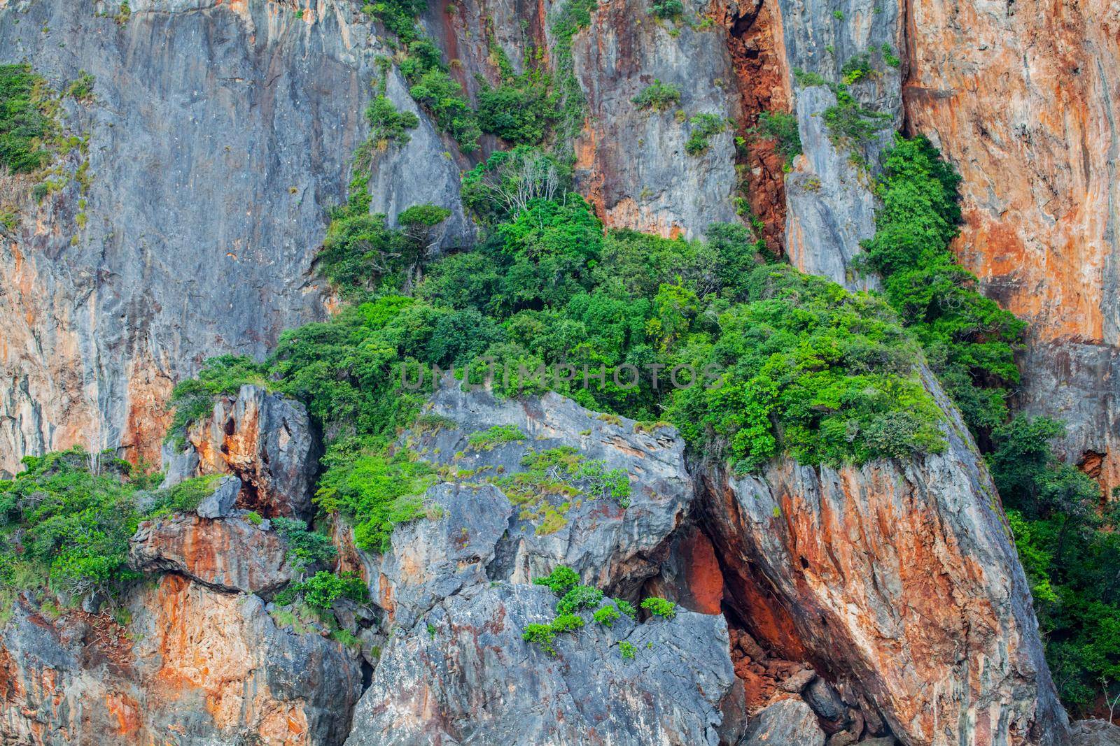 Natural background of limestone mountains and trees in thailand