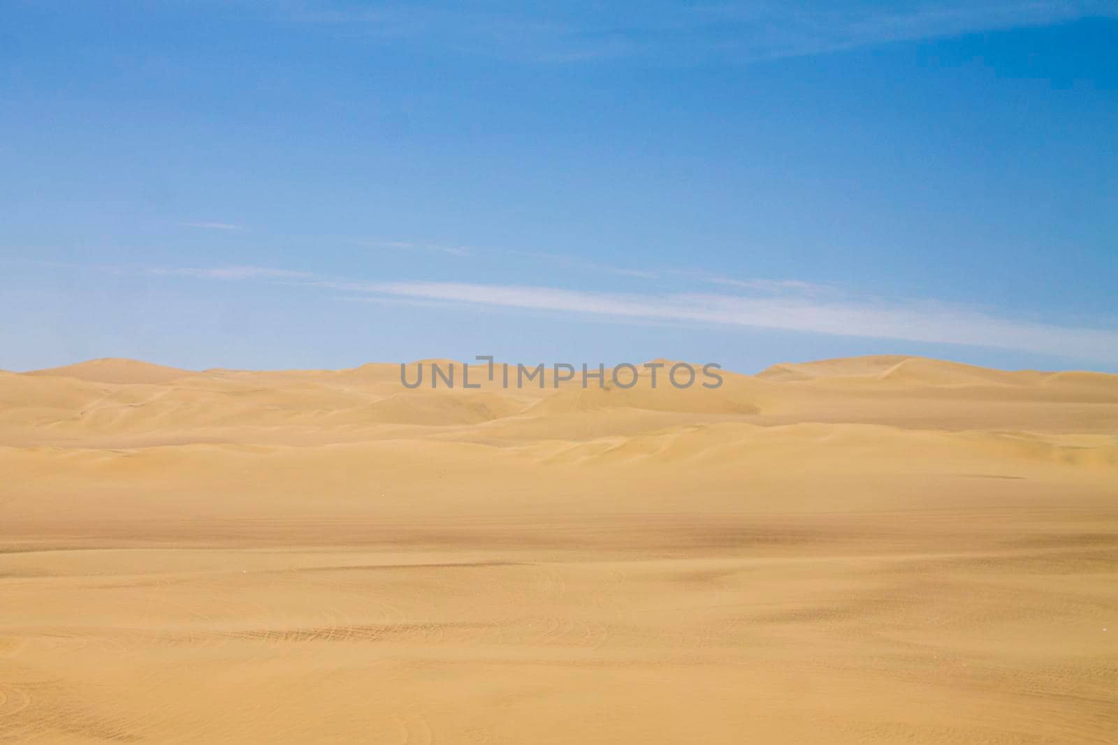 View of the dunes of Ica under the blue sky of Peru by eagg13