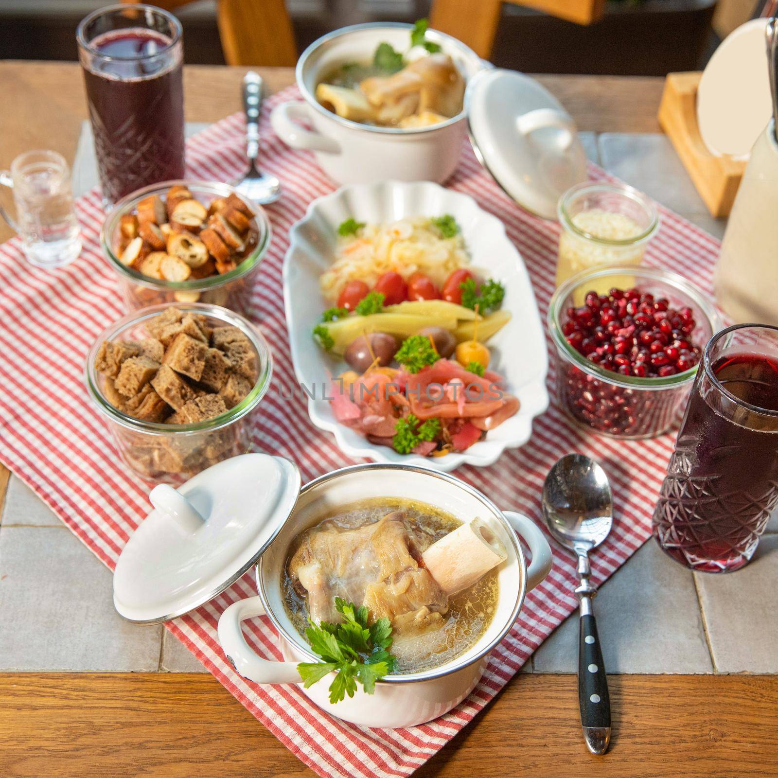 Pomegranate juice with vodka meat meals and snacks, top view by ferhad