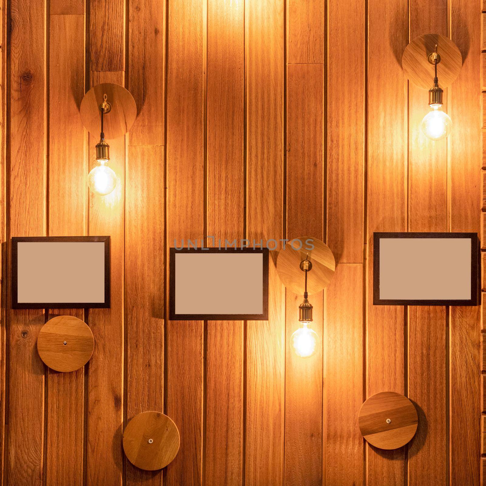 Restaurant, pub interior with photo frames, wooden wall