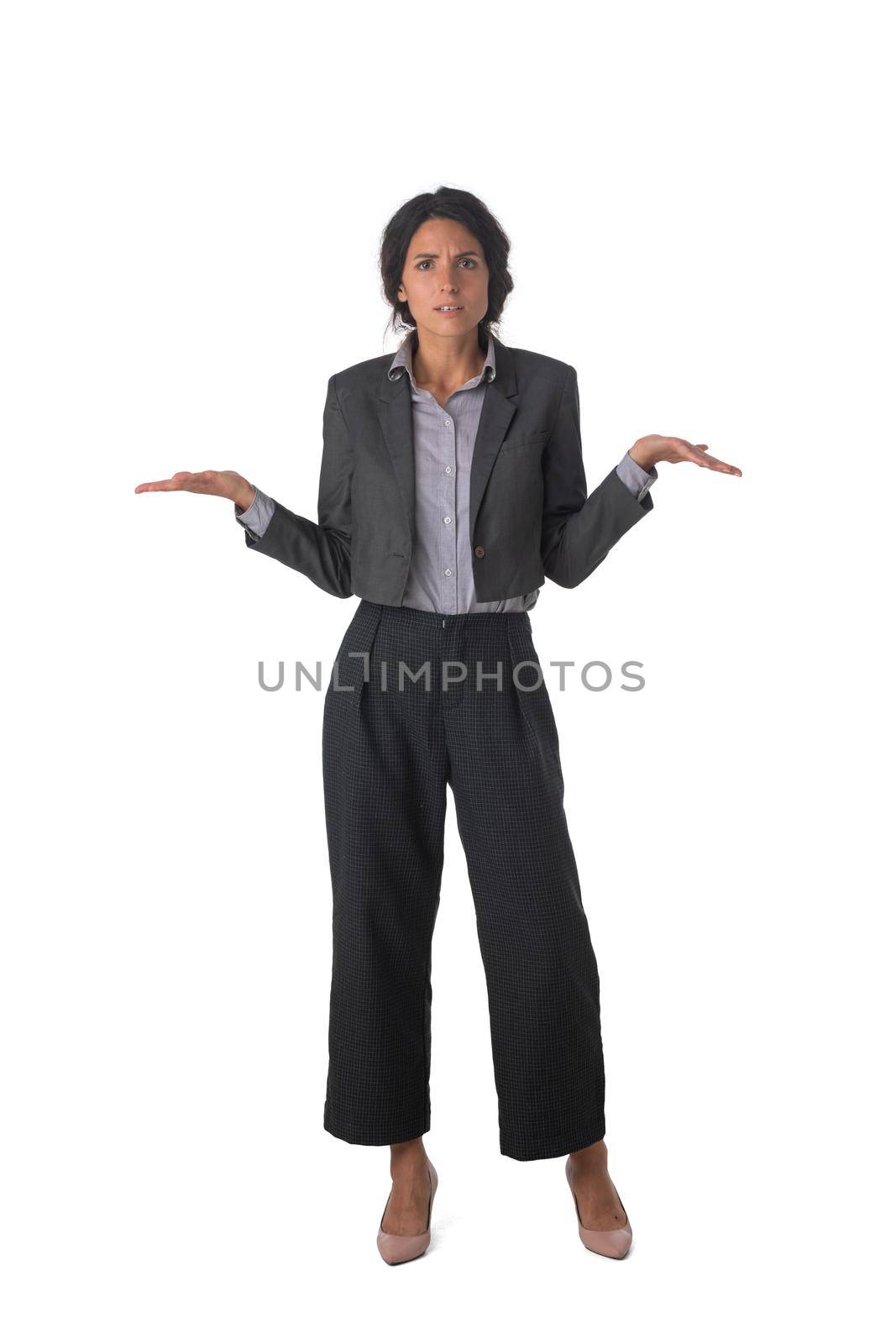Full length portrait of puzzled business woman shrugging shoudres studio isolated on white background, business people