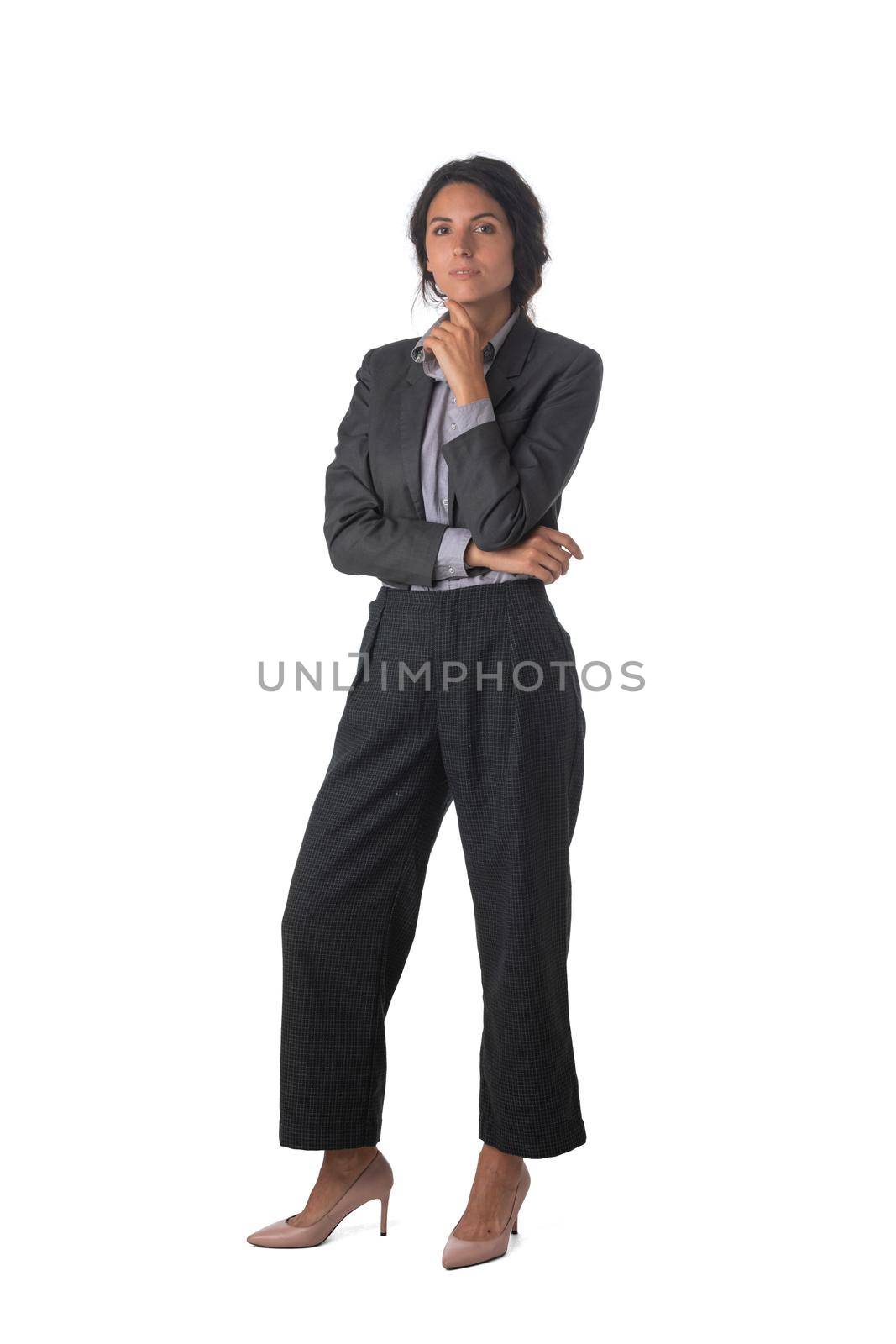 Full length portrait of pensive business woman looking up holding hand to chin studio isolated on white background, business people