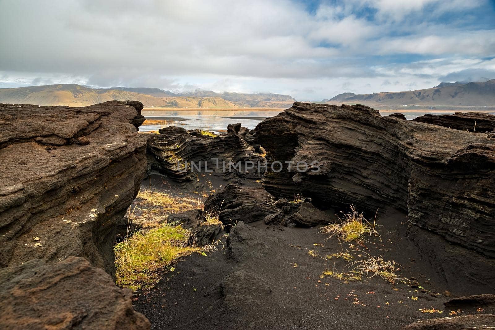 Volcanic rock formation near Dyrholaey, Iceland by LuigiMorbidelli