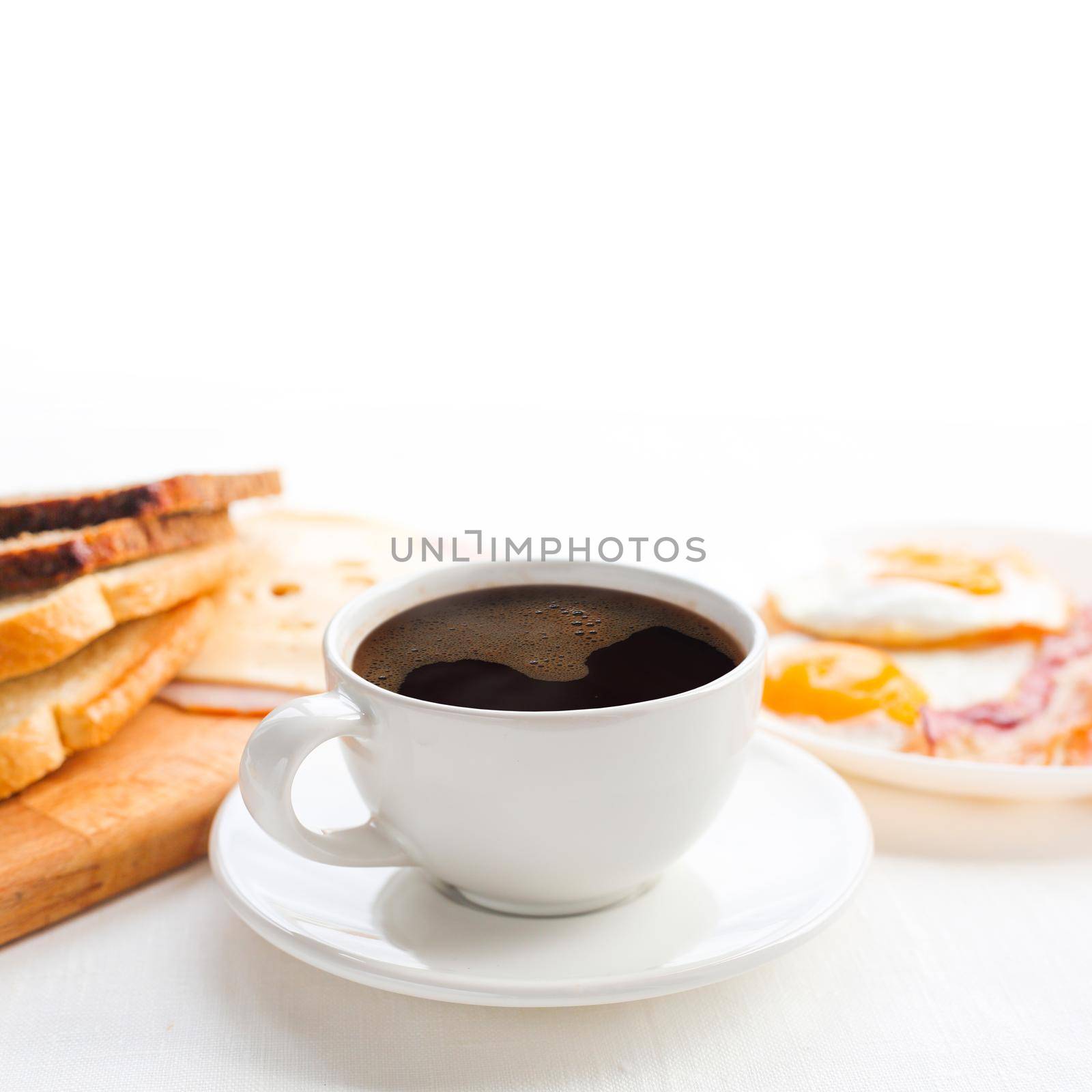 Breakfast with coffee on table by destillat