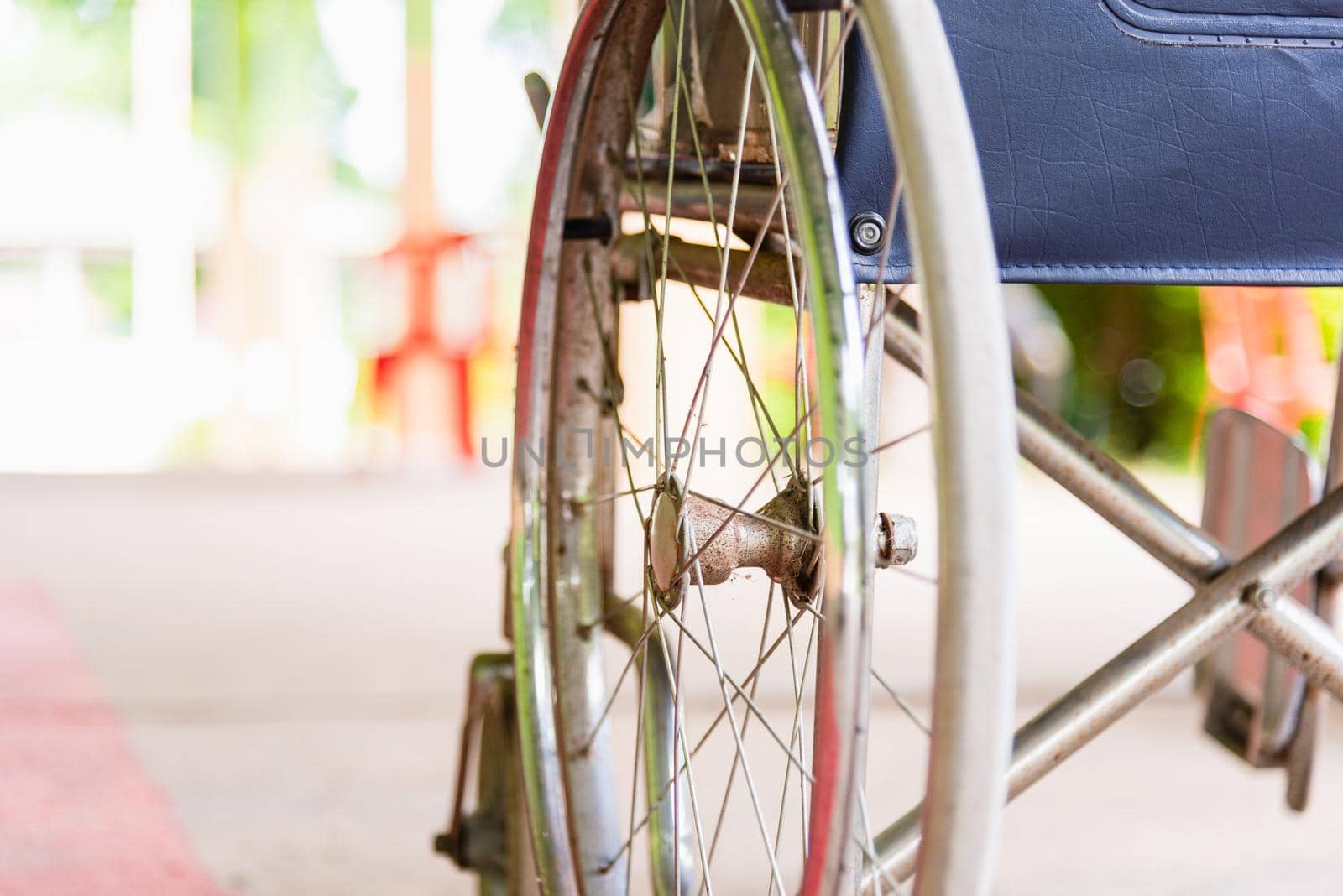 Closeuo empty wheelchairs in the hospital parked waiting for physical patient services, medical care concept