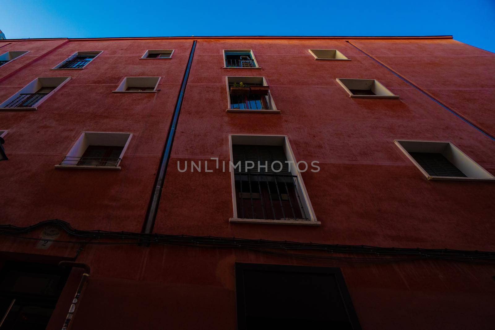 Madrid building in red seen from below