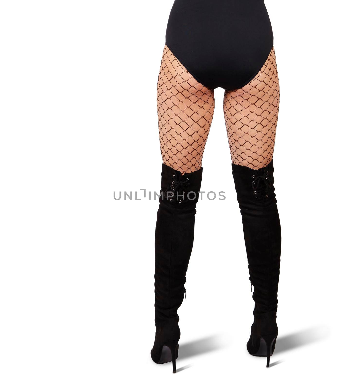 slender female legs in mesh tights and black boots by raddnatt