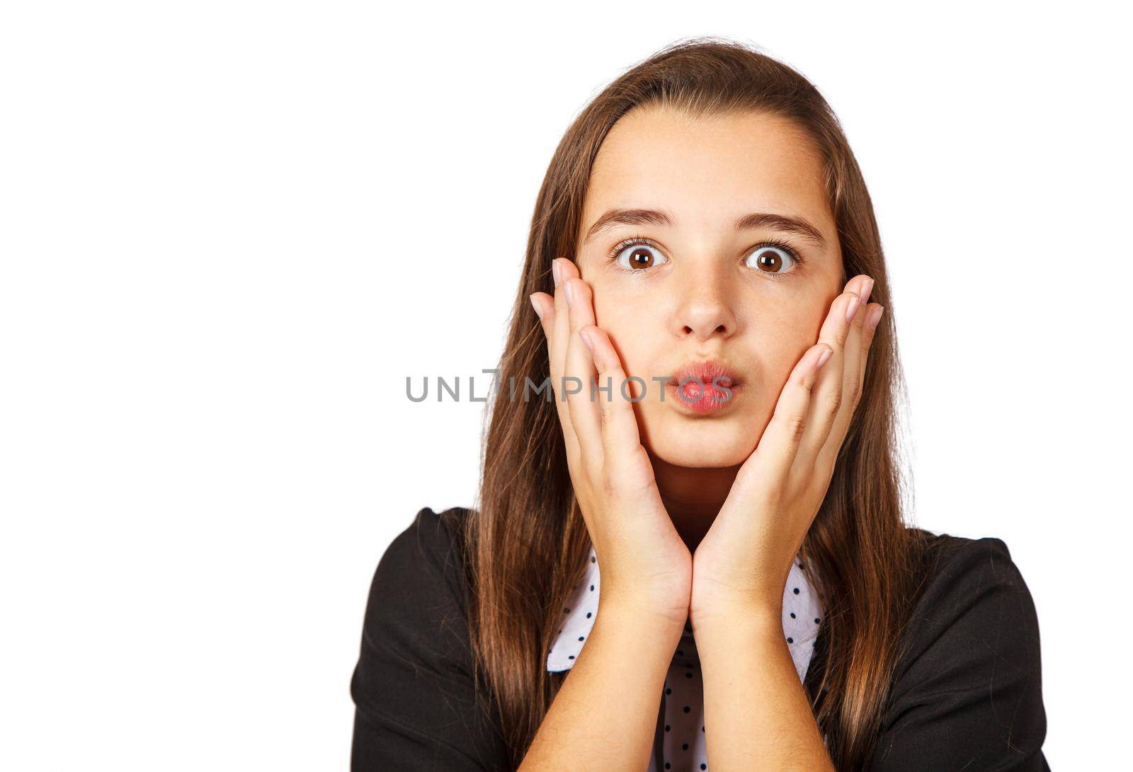 surprised brunette teen girl covering her mouth with hands isolated on white background