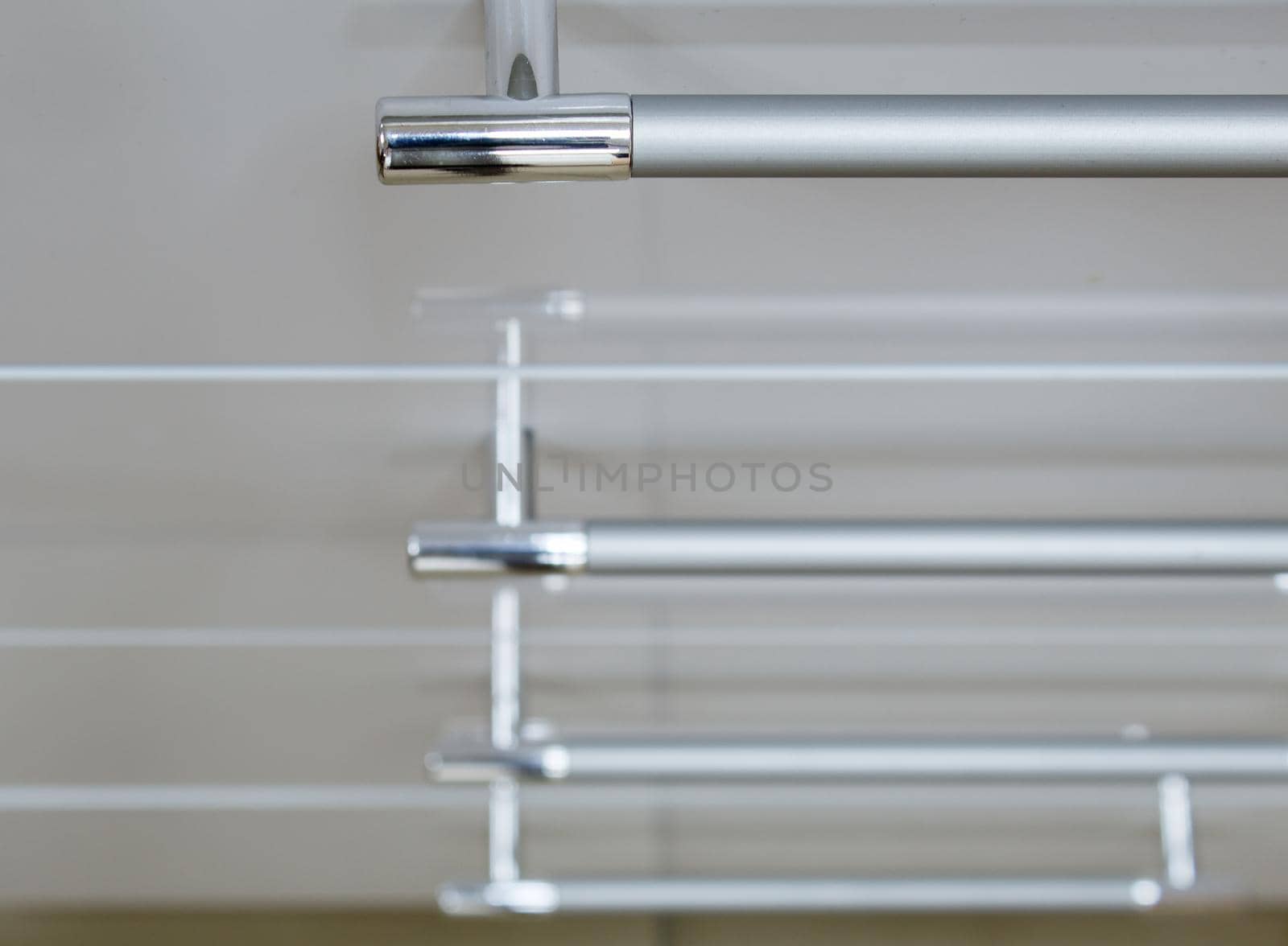 handles on the dresser closeup. geometric abstraction. indoor closeup